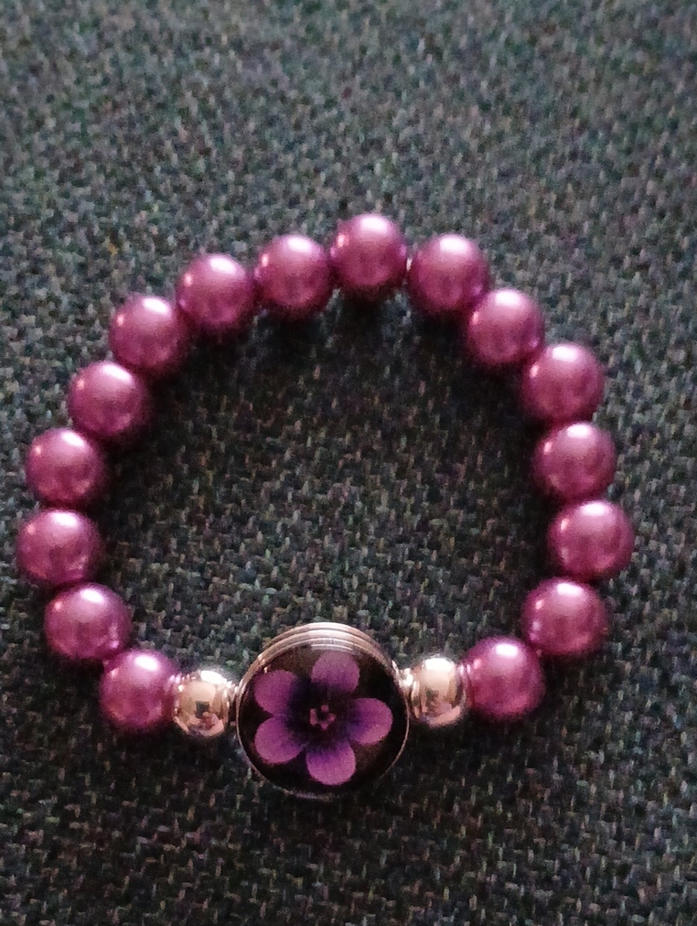 Purple Beaded Stretch Bracelet with Floral Center Accent